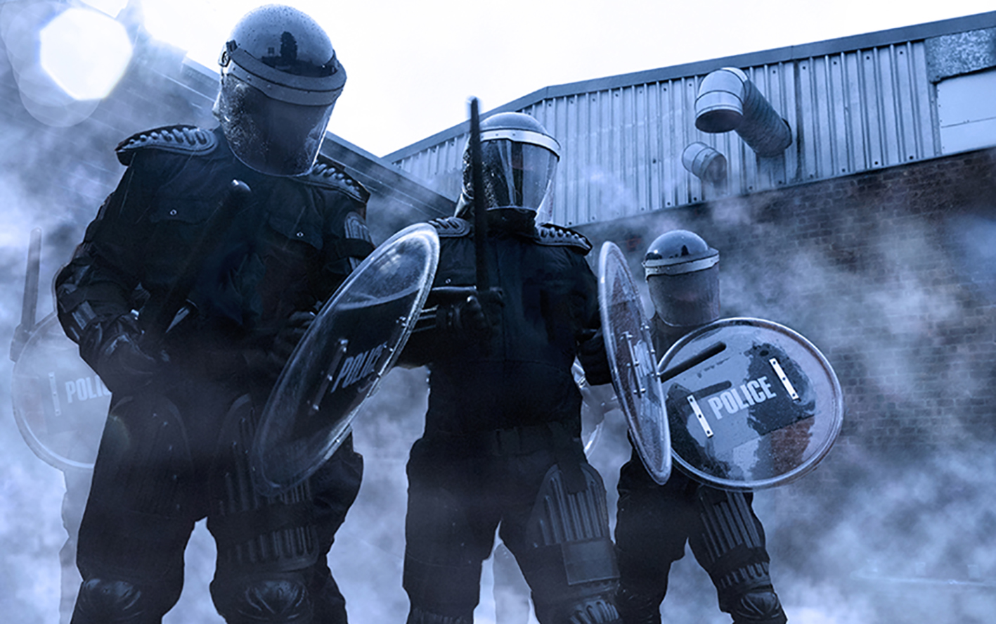 TECHPEACE riot helmet, riots shields, and riot gear, shown in action.
